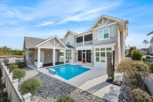 back of property featuring a patio, a fenced backyard, a ceiling fan, roof with shingles, and a fenced in pool