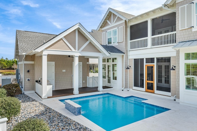 back of house featuring central AC, a patio, ceiling fan, and french doors