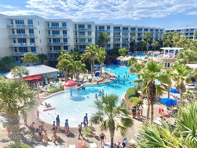 view of pool with pool water feature