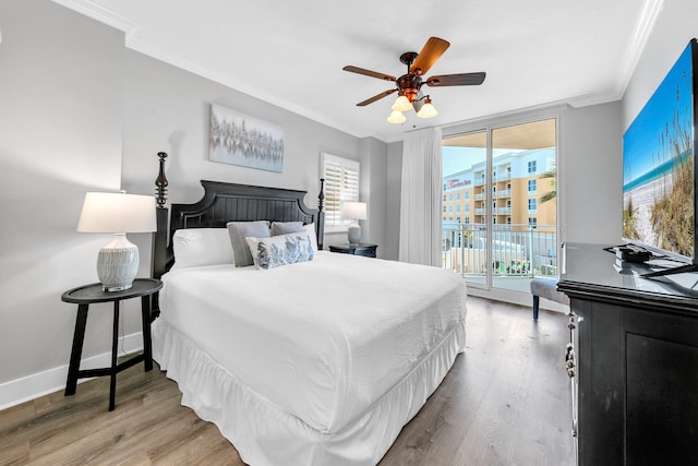 bedroom with crown molding, wood-type flooring, access to exterior, and ceiling fan