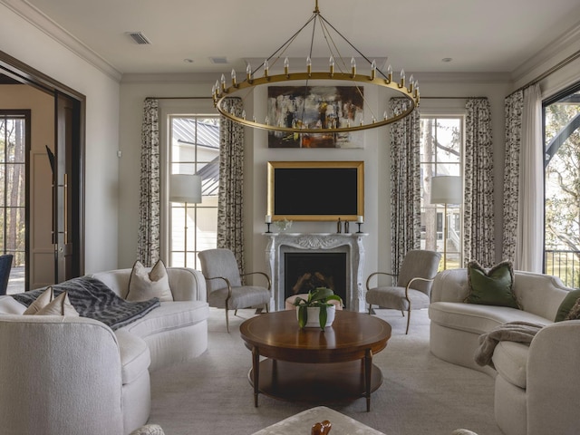 living area with visible vents, a premium fireplace, and ornamental molding