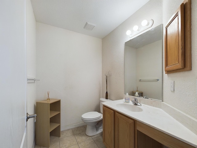 half bath with toilet, tile patterned flooring, visible vents, and vanity