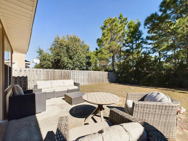 view of patio with a fenced backyard and outdoor lounge area