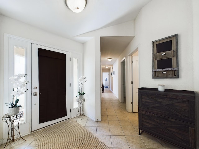 entrance foyer with light tile patterned flooring