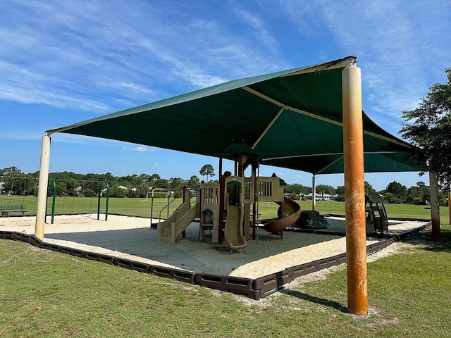 community play area featuring a yard