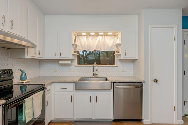 kitchen featuring sink, dishwasher, black range with electric stovetop, light stone counters, and white cabinets