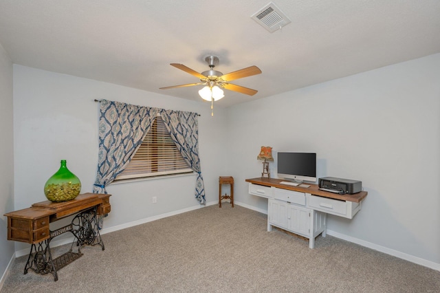 office area with ceiling fan and light colored carpet