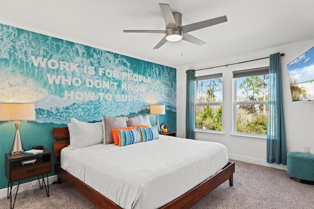 carpeted bedroom with ceiling fan