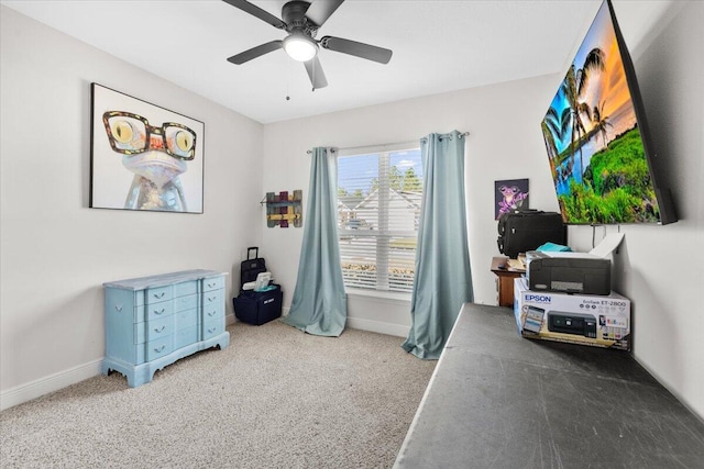 office area with carpet and ceiling fan