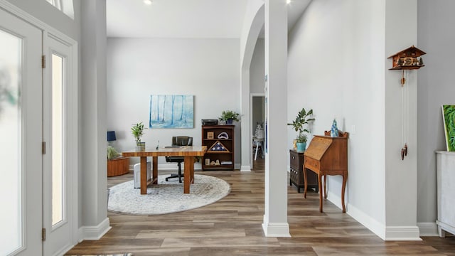 office area with wood-type flooring