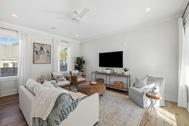 83 Sawgrass Ln, Santa Rosa Beach, FL 32459 - living room featuring crown molding, plenty of natural light, and light wood-type flooring