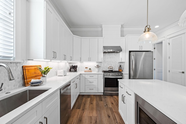 83 Sawgrass Ln, Santa Rosa Beach, FL 32459 - kitchen featuring white cabinetry, decorative light fixtures, and appliances with stainless steel finishes