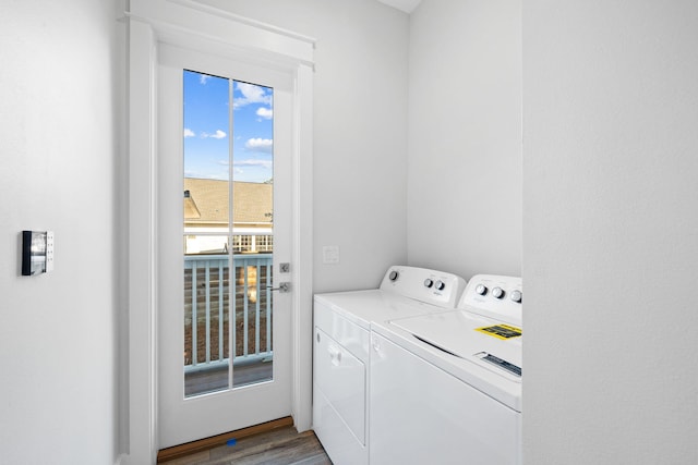 83 Sawgrass Ln, Santa Rosa Beach, FL 32459 - washroom featuring hardwood / wood-style floors and washer and clothes dryer