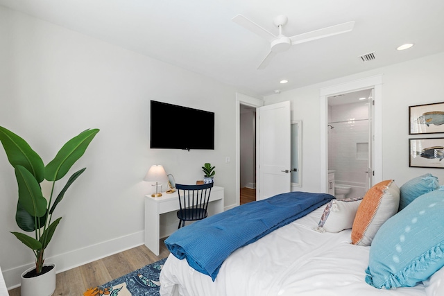 83 Sawgrass Ln, Santa Rosa Beach, FL 32459 - bedroom with ceiling fan, ensuite bath, and light hardwood / wood-style floors