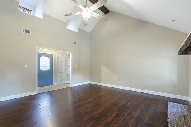 interior space featuring beam ceiling, wood finished floors, visible vents, and baseboards