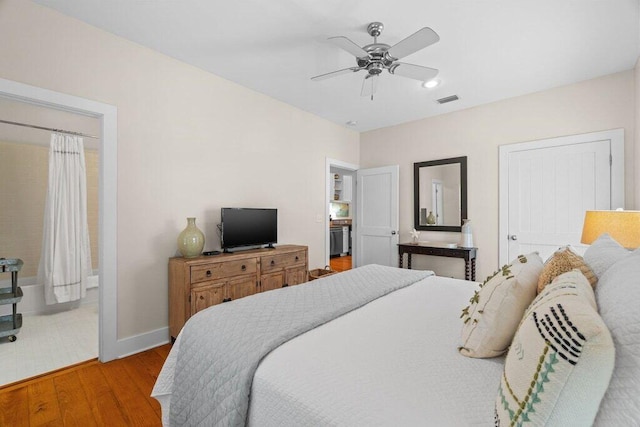 bedroom featuring ceiling fan and light hardwood / wood-style floors