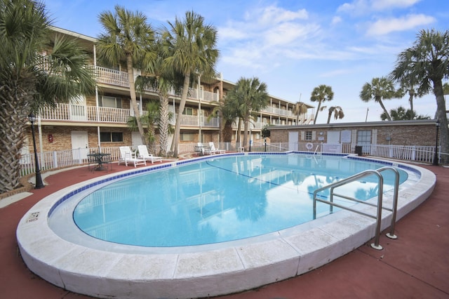 community pool with fence