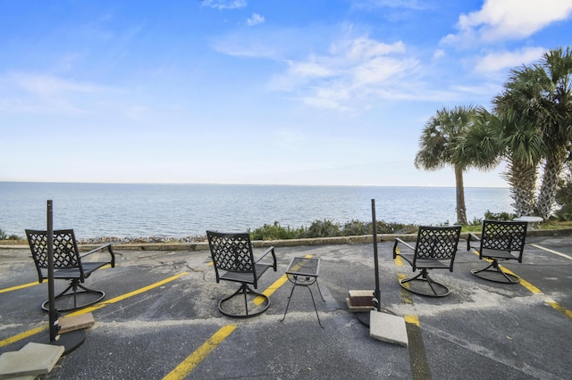 view of patio / terrace with a water view