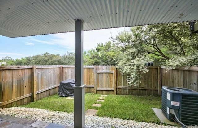 view of yard with central air condition unit