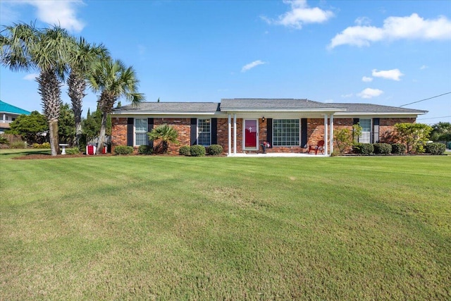 single story home with a front yard