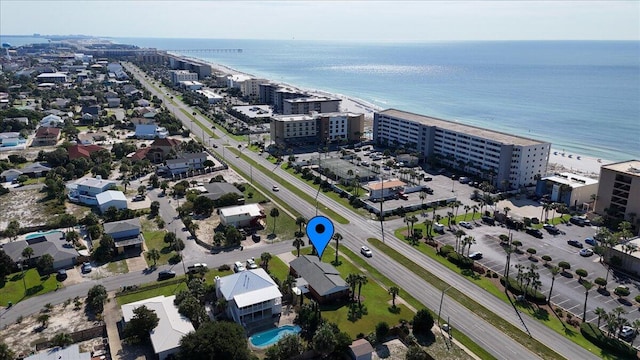 aerial view with a beach view and a water view