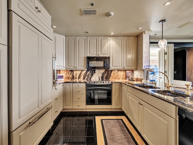 kitchen with sink, tasteful backsplash, pendant lighting, dark stone counters, and black appliances