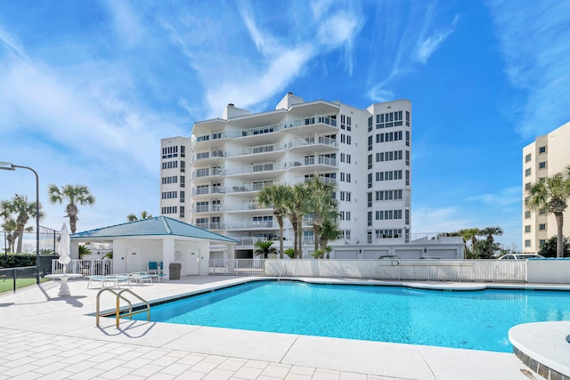 view of pool featuring a patio