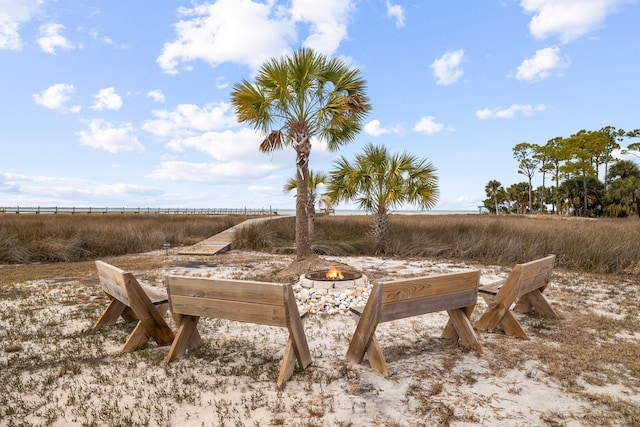 exterior space with an outdoor fire pit