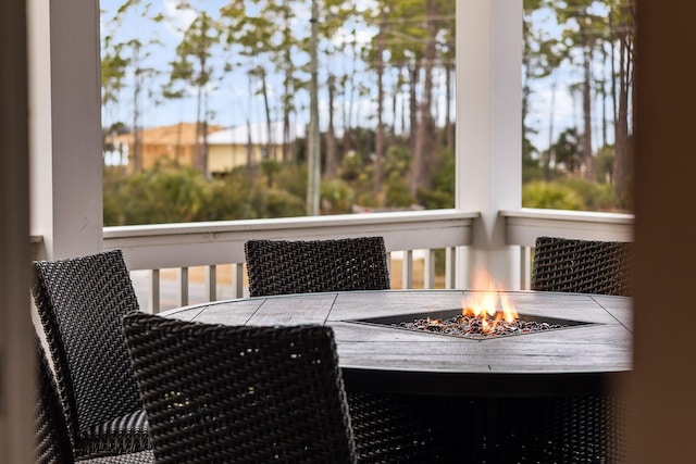 balcony with an outdoor fire pit