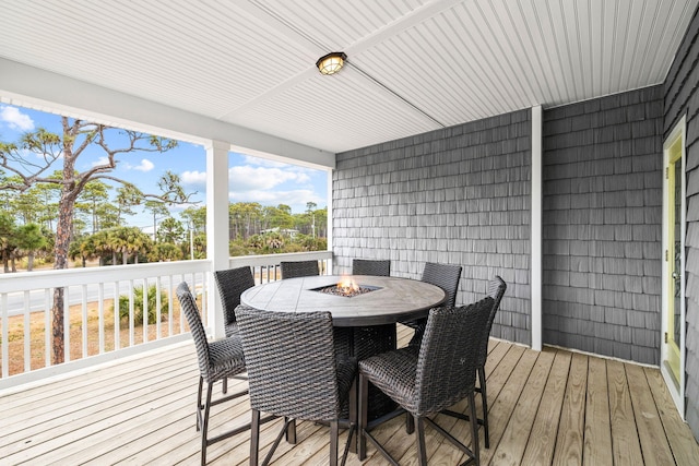 deck featuring a fire pit