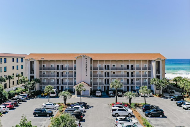 view of building exterior with a water view