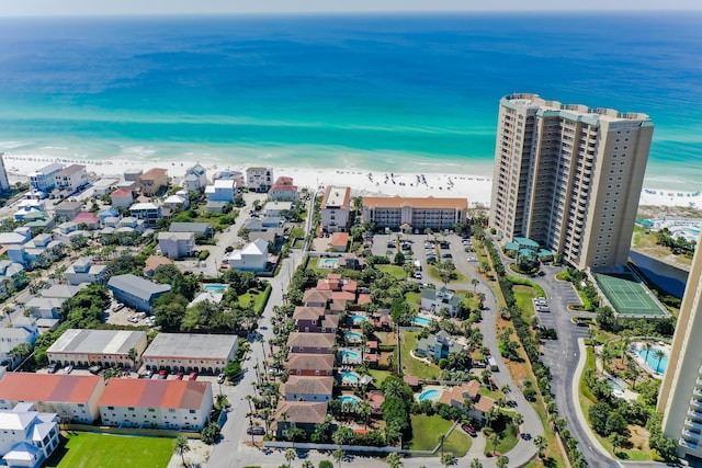 bird's eye view featuring a view of the beach and a water view