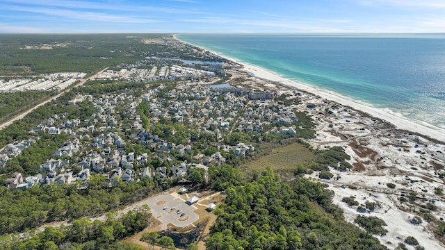 aerial view featuring a water view and a view of the beach