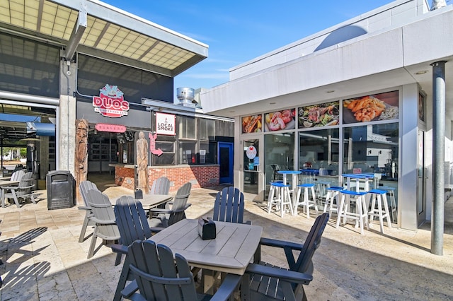 view of patio with outdoor dining area