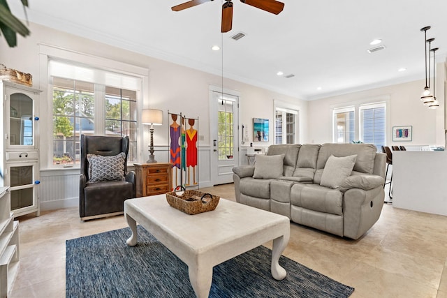 living room featuring crown molding