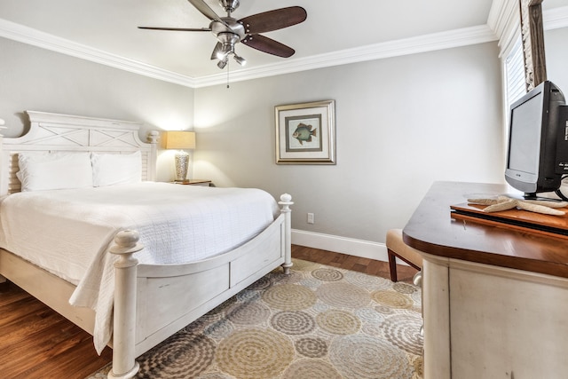 bedroom featuring crown molding, wood-type flooring, and ceiling fan