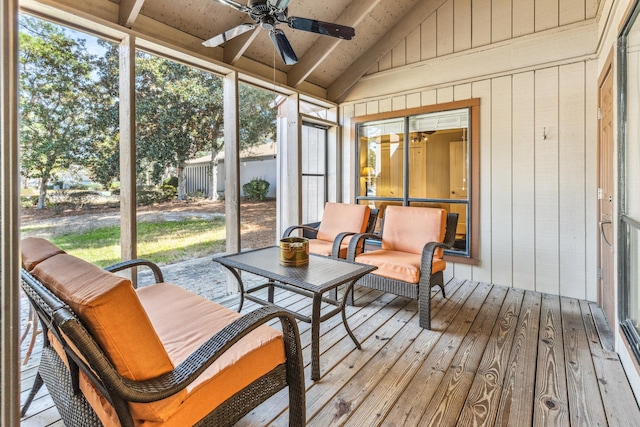 sunroom / solarium with vaulted ceiling and ceiling fan