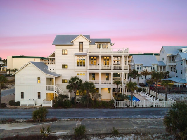 view of outdoor building at dusk