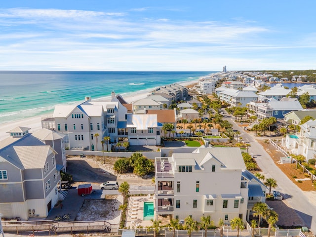 aerial view featuring a water view and a beach view