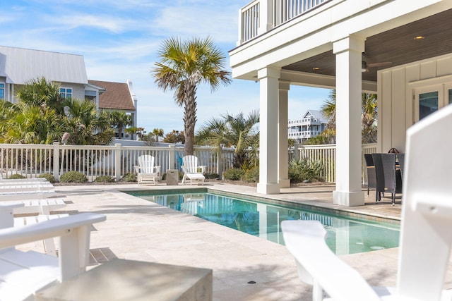 view of pool featuring a patio