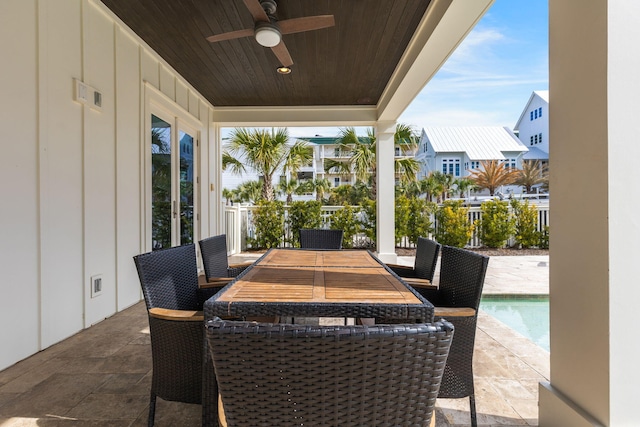 view of patio featuring ceiling fan