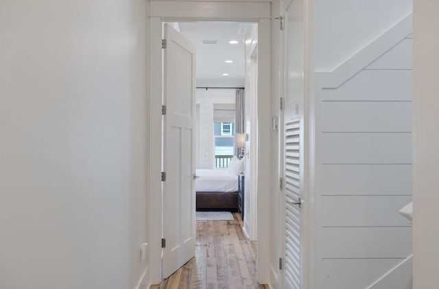 corridor with light wood-type flooring