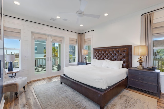 bedroom with access to outside, french doors, ceiling fan, and light wood-type flooring