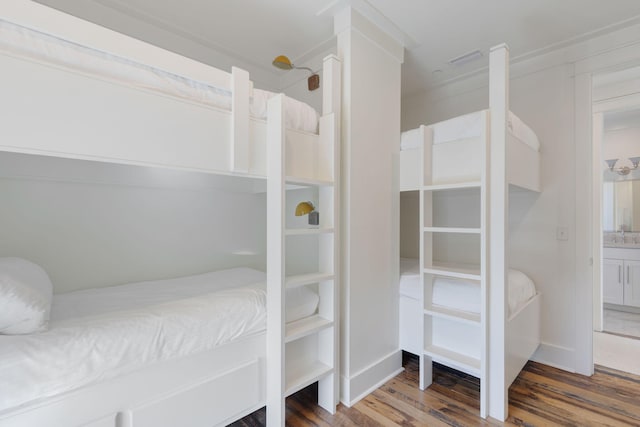 bedroom featuring hardwood / wood-style flooring