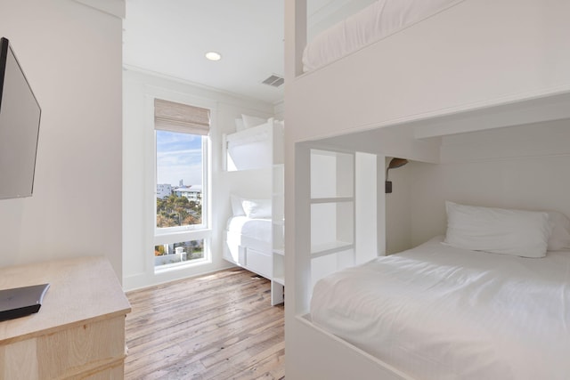 bedroom with light hardwood / wood-style flooring