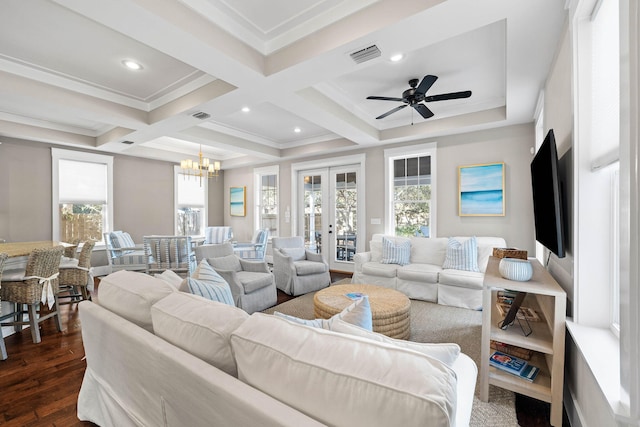 living room with coffered ceiling, dark hardwood / wood-style flooring, ceiling fan with notable chandelier, french doors, and beamed ceiling