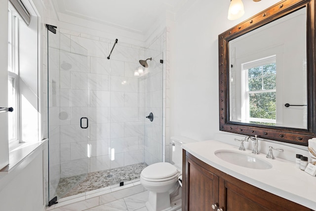 bathroom with walk in shower, vanity, and toilet