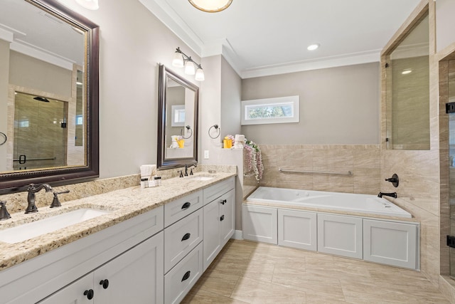 bathroom with ornamental molding, shower with separate bathtub, and vanity