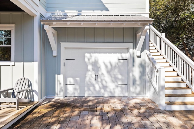 property entrance with a garage