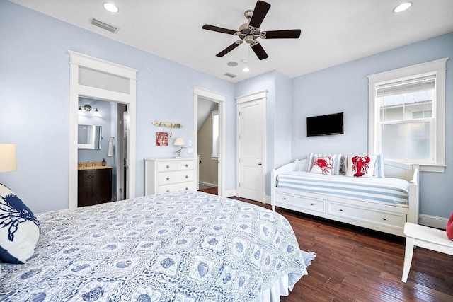 bedroom featuring dark hardwood / wood-style flooring and ceiling fan